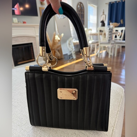 bebe Handbags - Bebe Black and Gold Quilted Satchel with Elegant Hardware